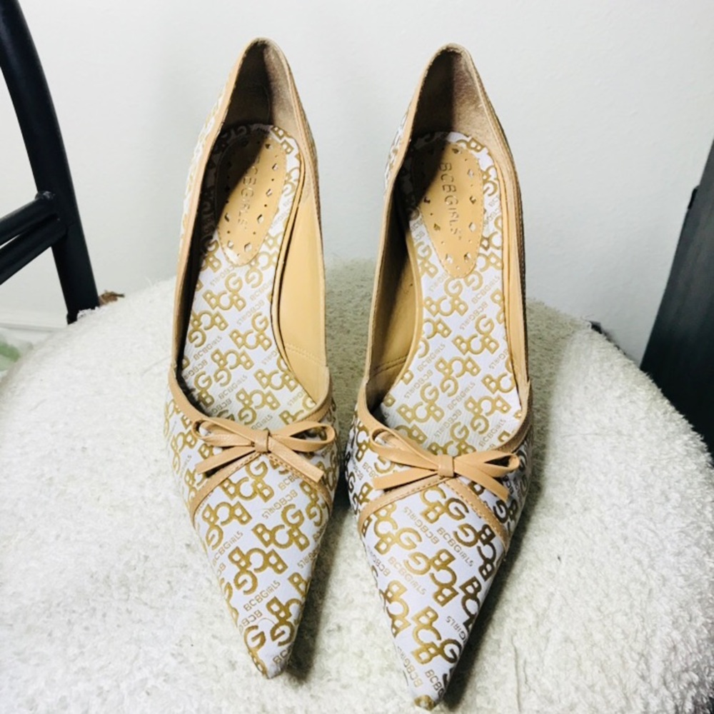 BCBGirls logo tan and white heels.